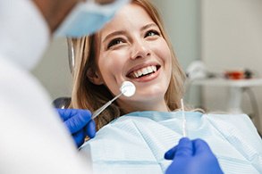 Lady smiles at dentist?